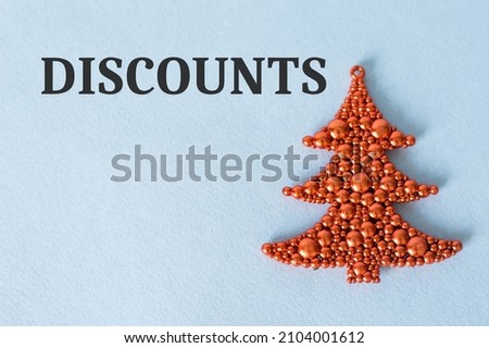 Discount text on a blue background next to herringbone decoration, shopping opportunity and consumerism concept