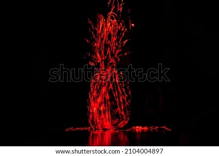Non-fungible token NFT, crypto art, digital art concept. Neon red laser pineapple on black background. Modern art,
