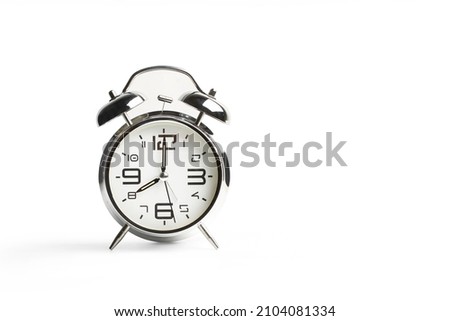 Bell alarm clock on a white background with copy space