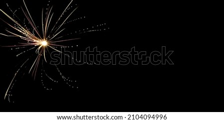 Composite photo of the salute on a long shutter speed. Fireworks against the black night sky.