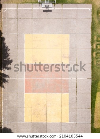 Aerial view of a sport field. Top view of multi sport field made of concrete.