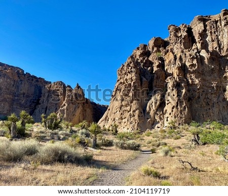 Hole-in-the-Wall Rings Trail in Mojave National Preserve, California Royalty-Free Stock Photo #2104119719