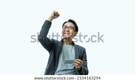 Businessman use smartphones to trade stocks, play games, show joy, show happy, isolated background.