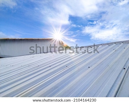Metal roof in  industrial building and construction. Royalty-Free Stock Photo #2104164230