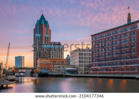 Downtown Milwaukee city skyline cityscape of Wisconsin in USA at sunset