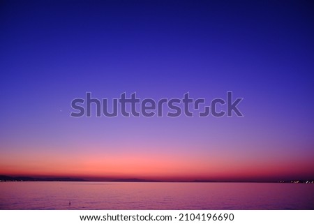 magic hour sunset and beach Royalty-Free Stock Photo #2104196690