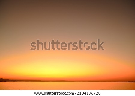 magic hour sunset and beach Royalty-Free Stock Photo #2104196720