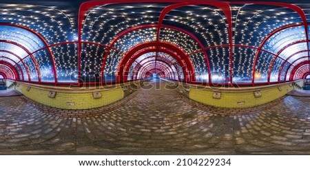 spherical night 360 panorama in festively lit underground passage tunnel with red frame arch and transparent dome and concrete staircase in equirectangular seamless projection, for VR AR content Royalty-Free Stock Photo #2104229234