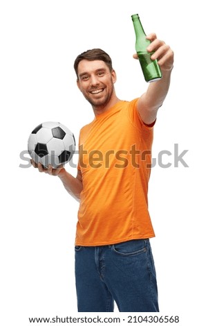 sport, leisure games and people concept - happy smiling man or football fan with soccer ball and bottle of beer over white background