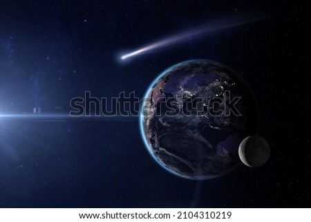 View of planet Earth, Moon and comet from space. Beautiful space background with planet Earth, Moon and flying comet. Elements of this image furnished by NASA. Royalty-Free Stock Photo #2104310219