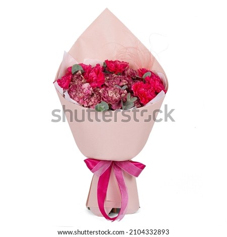 Bunch of red bouquet of flowers in a pink paper wrap cone isolated on white background Royalty-Free Stock Photo #2104332893