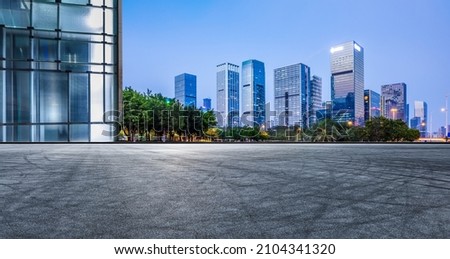Panoramic skyline and modern commercial office buildings with empty road in Shenzhen, China. Asphalt road and cityscape. Royalty-Free Stock Photo #2104341320