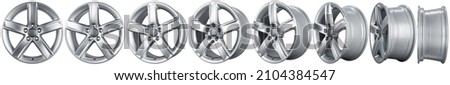 set collection of modern shiny silver metallic alloy aluminum car rim isolated on white background. automotive part indurstry transportation concept Royalty-Free Stock Photo #2104384547