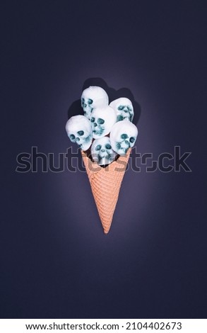 Ice Cream cone with a Skulls. Flat lay.