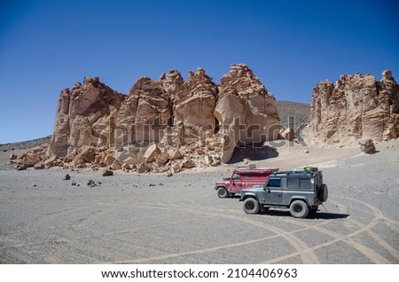 Two cars in the Atacama Desert
 Royalty-Free Stock Photo #2104406963