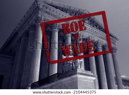 Roe V Wade stamp with the United States Supreme Court in background     Royalty-Free Stock Photo #2104445375