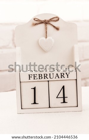 Valentine’s Day. February 14th , date calendar on white background.  White block calendar present date 14 and month February, Save the date. 