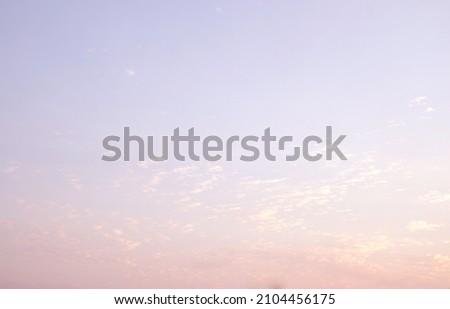 Dramatic sky when sunset. Beautiful twilight sky with slightly clouds  Royalty-Free Stock Photo #2104456175