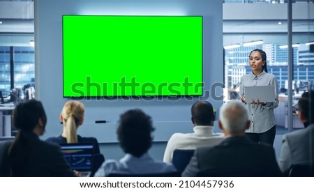 Modern Product Presentation Event: Black Businesswoman Speaks, Uses Green Chroma Key Screen Wall TV. Press Conference for Group of Diverse Investors, Digital Entrepreneurs, Businesspeople