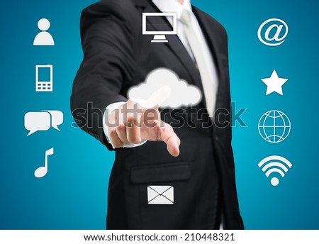 Businessman hand touch cloud computing concept on blue background