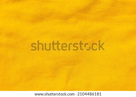 Yellow fabric texture background. Template for labels. Free space for text.