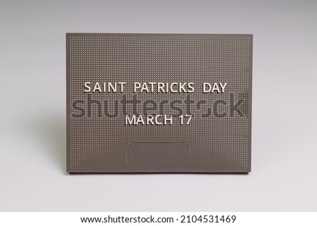 holiday saint patrick's day lettering on gray chalkboard, white background