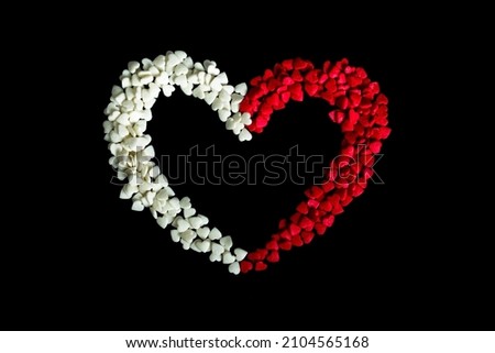 Valentine's day red and white hearts on black background