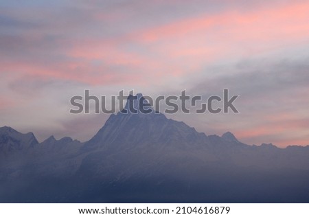 Mountain Machapuchare, sacred for Buddhists and Hindus, on which climbing is prohibited, at dawn