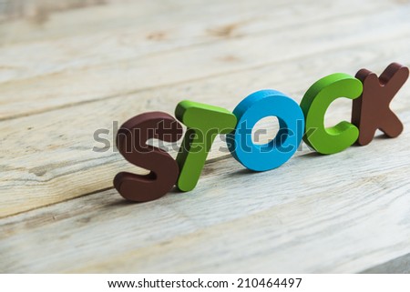 Colorful wooden word Stock on wooden floor