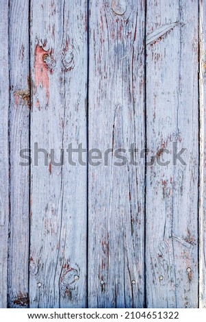 Weathered blue wooden background texture. Distressed, worn, weathered, old, blue and white, wooden panel abstract background.