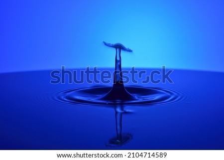 Studio shot of high-speed photography of falling water droplets