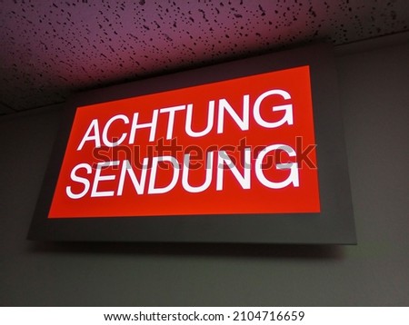 German sign "Achtung Sendung" translated into English "On Air" 