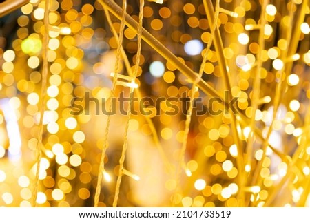 Abstract gold bokeh with black background with black background for backdrop valentine'day
