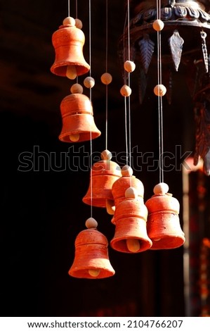 Clay hanging bells, Clay Little Bells, Clay Hanging Bells Handmade for Home decoration. Royalty-Free Stock Photo #2104766207