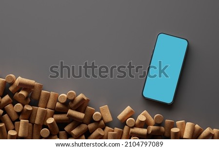 Mockup of a smartphone device and wine corks over grey background. Top view. 3D rendering