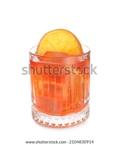 Glass of negroni cocktail with lemon slice on white background