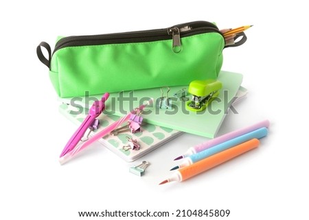 Different stationery supplies on white background