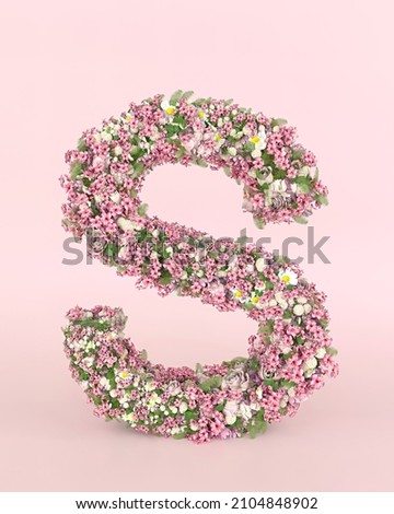 Creative letter S concept made of fresh Spring wedding flowers. Flower font concept on pastel pink background.