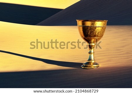 Old copper chalice in the desert sand. Royalty-Free Stock Photo #2104868729
