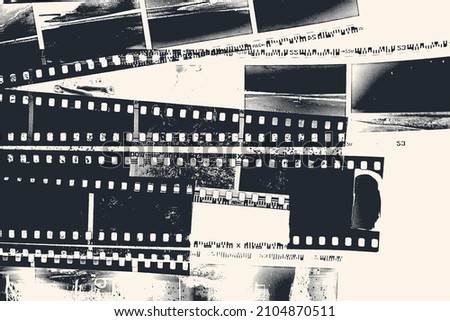 Abstract background with cut strips of photographic negatives film. Vector illustration Royalty-Free Stock Photo #2104870511