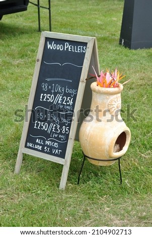 Hand Made Sign and Clay Pot Outside Tent at Agricultural Show 