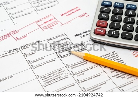 Tax Form 1099-misc on a white background. Royalty-Free Stock Photo #2104924742
