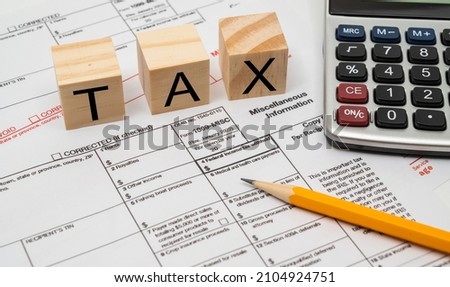 Tax Form 1099-misc on a white background. Royalty-Free Stock Photo #2104924751
