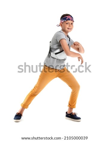 Dancing little boy isolated on white