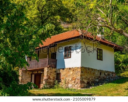 View at traditional 19th century Serbian house at Lepenski Vir, Serbia Royalty-Free Stock Photo #2105009879