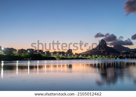 sunset at the Rodrigo de Freitas Lagoon in Rio de Janeiro.