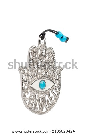 Metal hamsa for blessing isolated on white background