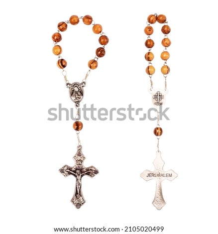 Set of an wooden rosary isolated on white background. Royalty-Free Stock Photo #2105020499
