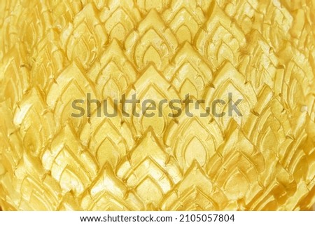 Gold yellow lotus petals flower stucco abstract on background