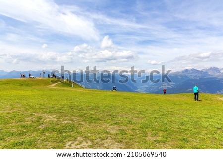 A beautiful view of Kronplatz (Plan de Corones) with mountain range in background, Italy